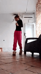 Girl practices gymnastics indoors in Sochi morning session