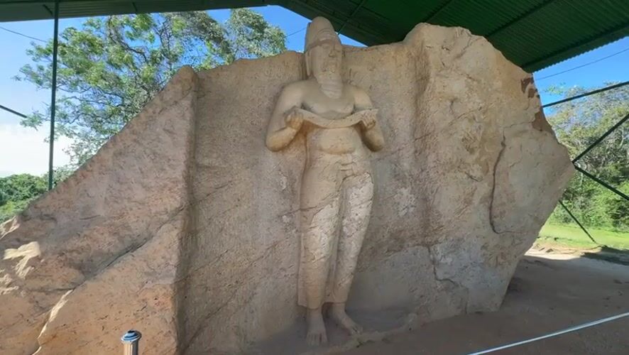Tourist captures ancient Buddhist carvings and scenery in Polonnaruwa