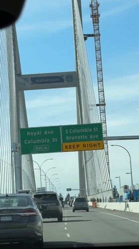 Vehicle crosses cable-stayed bridge in Surrey, Canada