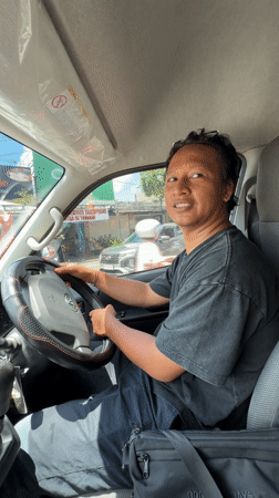 Man sits in driver's seat in Kuta Selatan