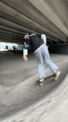 Skating under a Saint Petersburg overpass on a summer afternoon