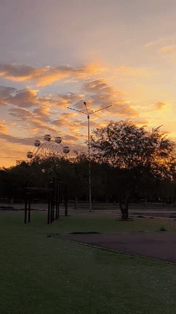Flag spinning practice at sunset in Qarağandı, Kazakhstan