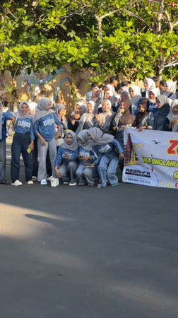 Group of hijab-wearing women pose for photos in Kuta Selatan