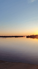 Sunset gathering documented at Chaikovsky port along Kama River