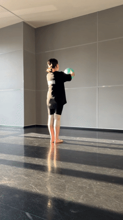 Dancer practices handstand routine in Saint Petersburg studio