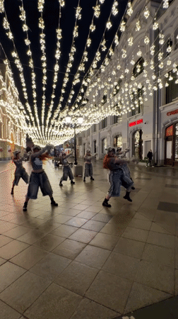 Dance group performs coordinated routine on Pasadena street