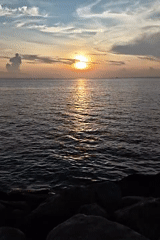 Sunset captured over ocean waters near Lhokseumawe, Indonesia