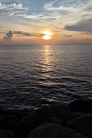 Sunset captured over ocean waters near Lhokseumawe, Indonesia