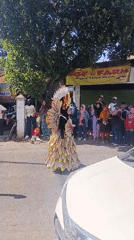 Traditional street parade winds through Kepuh Kiriman, East Java