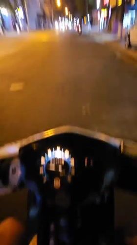 Nighttime motorcycle ride documented through Bắc Nha Trang streets