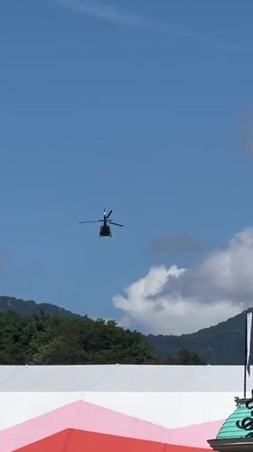 Ornate casino, exotic cars, and mountain scenery in Estosadok