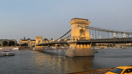 Budapest landmarks glow along the Danube at dusk