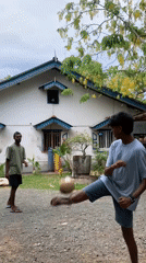 Young men play sepak takraw in Rumassala gravel court