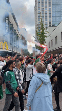 Algerian flag-waving crowd celebrates in Rotterdam streets