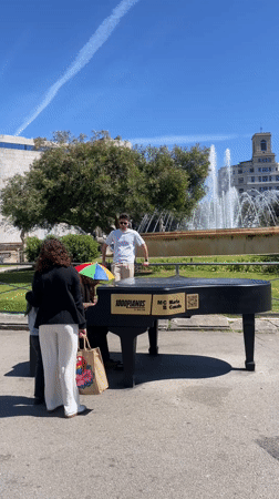 Skateboarder spotted in red jacket cruising Barcelona streets