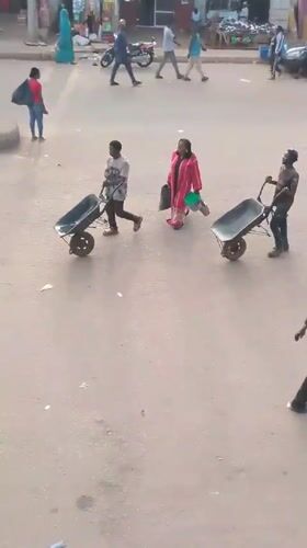 Busy street life documented in Bukuru, Nigeria afternoon