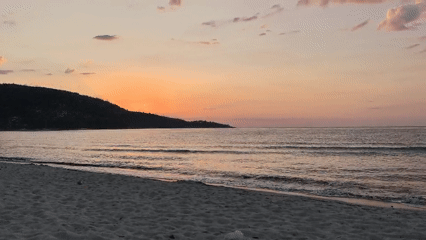 Golden Beach sunset, Thassos — warm sky meets quiet shoreline