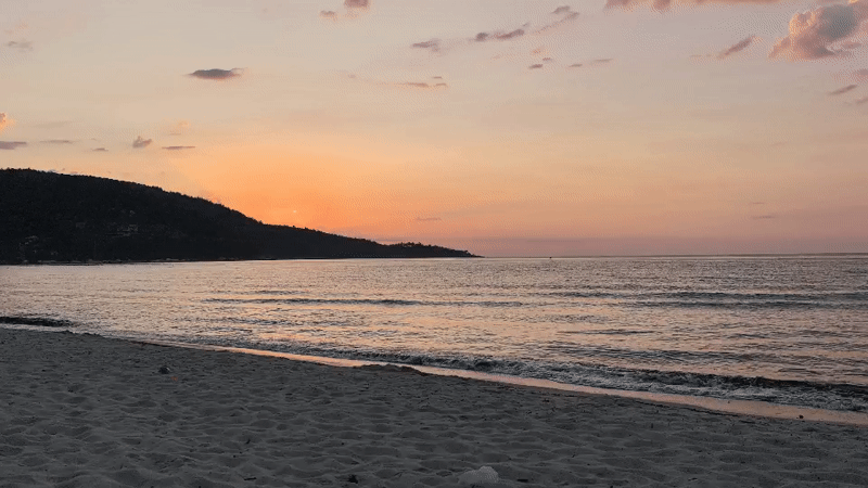 Golden Beach sunset, Thassos — warm sky meets quiet shoreline