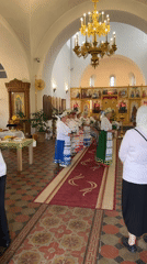 Inside a Russian church with food laid out for a gathering