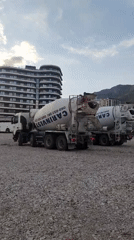 Industrial trucks, beachfront buildings, and coastal scenes documented Saturday
