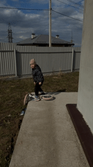 Child practices balance bike riding in Chaikovsky, Russia
