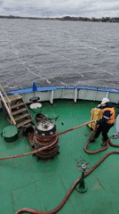 Worker in safety gear filmed on boat deck near Russian town