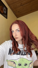 Woman poses in Mandalorian shirt for selfie in Sofia