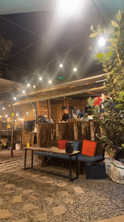 Fresh strawberries at a lit night stall in Da Lat