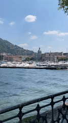 Lake Como marina and cityscape documented from elevated viewpoint