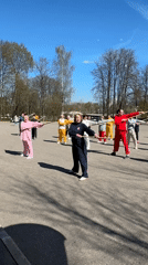 Group practices Tai Chi in Moscow park