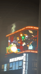 Electronic billboard shows bilingual CGI animation in Shibuya