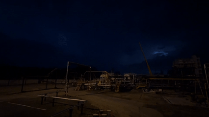 Lightning illuminates Russian industrial facility at night