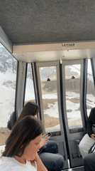 Tourists ride gondolas, photograph scenery at Kazakhstan ski resort