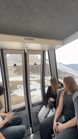 Tourists ride gondolas, photograph scenery at Kazakhstan ski resort