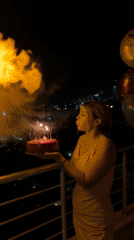 Birthday celebration captured on balcony in Budva, Montenegro