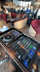 DJ Event at High-Rise London Venue Captures Sunset Cityscape