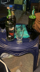 Evening social gathering at outdoor bar in Jos, Nigeria