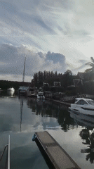 Ko Kaeo marina on a cloudy morning, yachts and waterfront resort