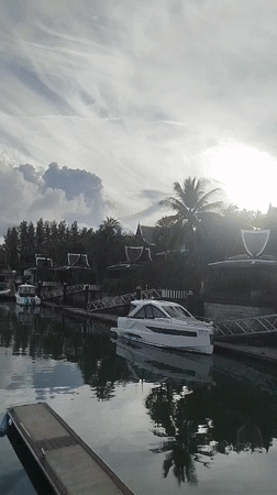 Ko Kaeo marina on a cloudy morning, yachts and waterfront resort