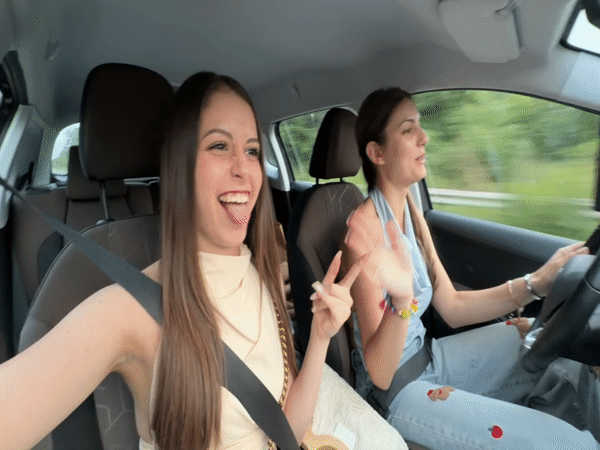 Two women travel by vehicle in Tsarevo, Bulgaria