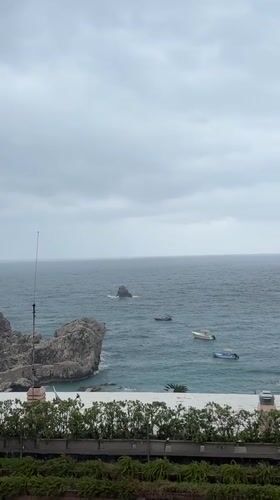Overcast coastal morning captured in Taormina, Italy