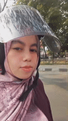 Helmeted selfie pause on a ride through Sumedang