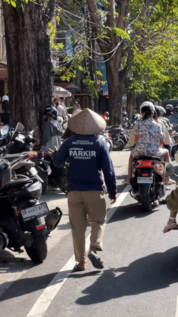 Morning street life observed across Denpasar, Indonesia