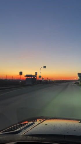 Evening drive captures sunset on Russian road