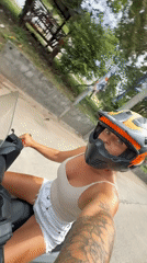 Scooter rider cruising through Ko Samui streets