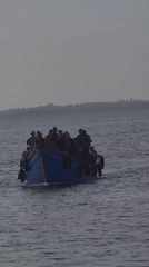 Indonesian fishing crews work overnight waterfront in Lhokseumawe