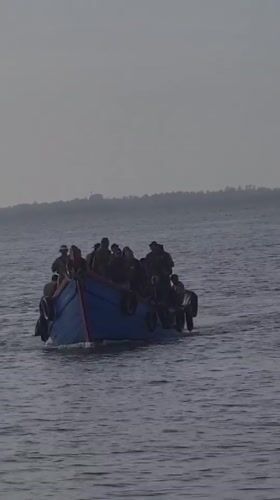 Indonesian fishing crews work overnight waterfront in Lhokseumawe