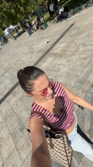 Woman films herself in Athens public square