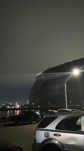 Nighttime coastal scenes documented in Arica, Chile waterfront area