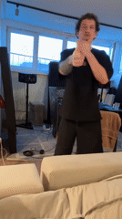 Young man dances in Moscow home recording studio